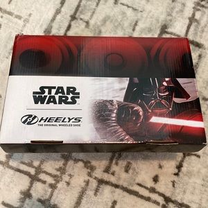 Tried on but not used Star Wars Heeleys! Instructions, parts & box all included!